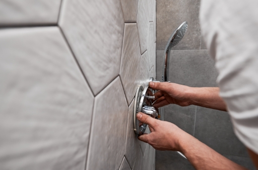 A technician working on a Plumbing Installation in Deerfield, IL